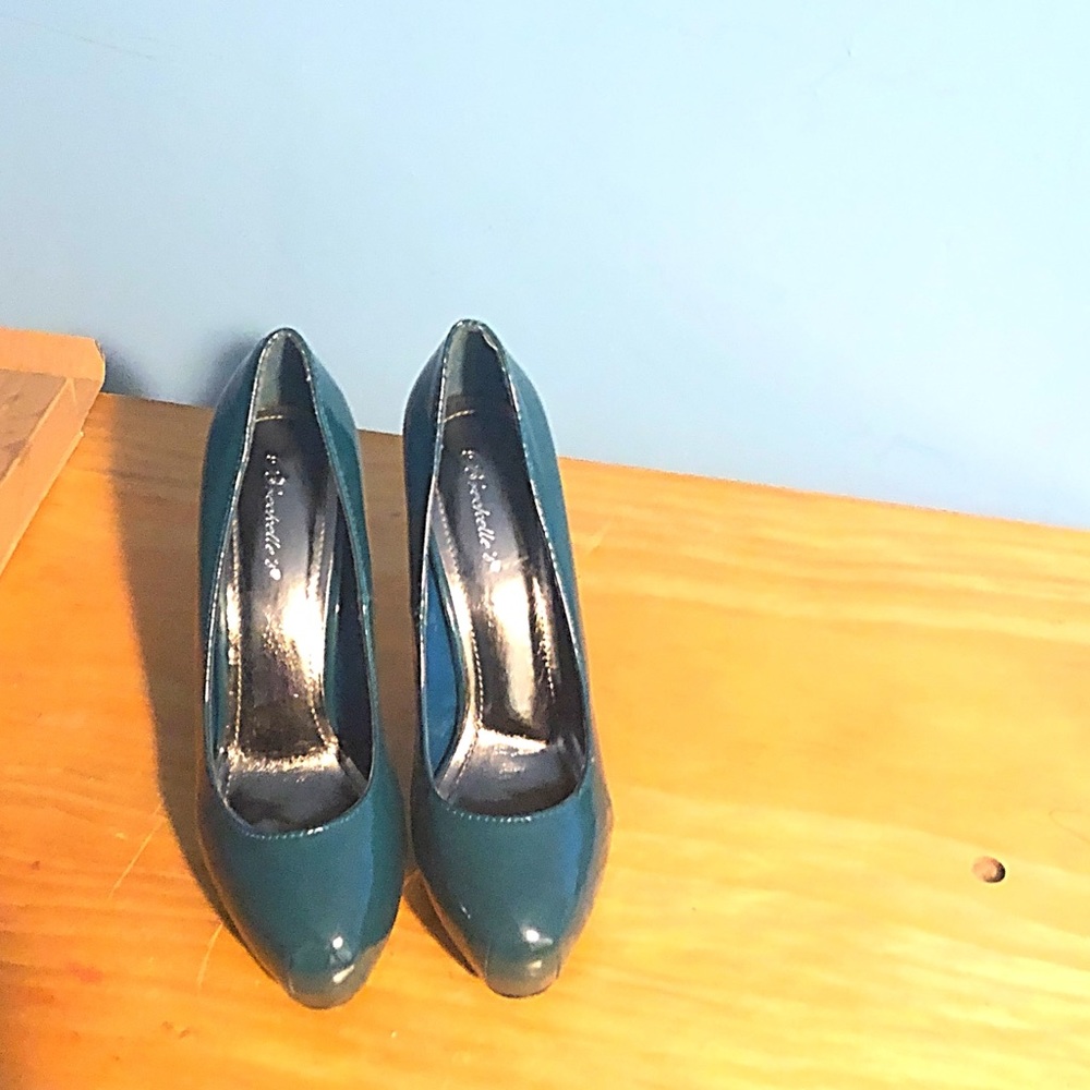 Hidden platform turquoise heels